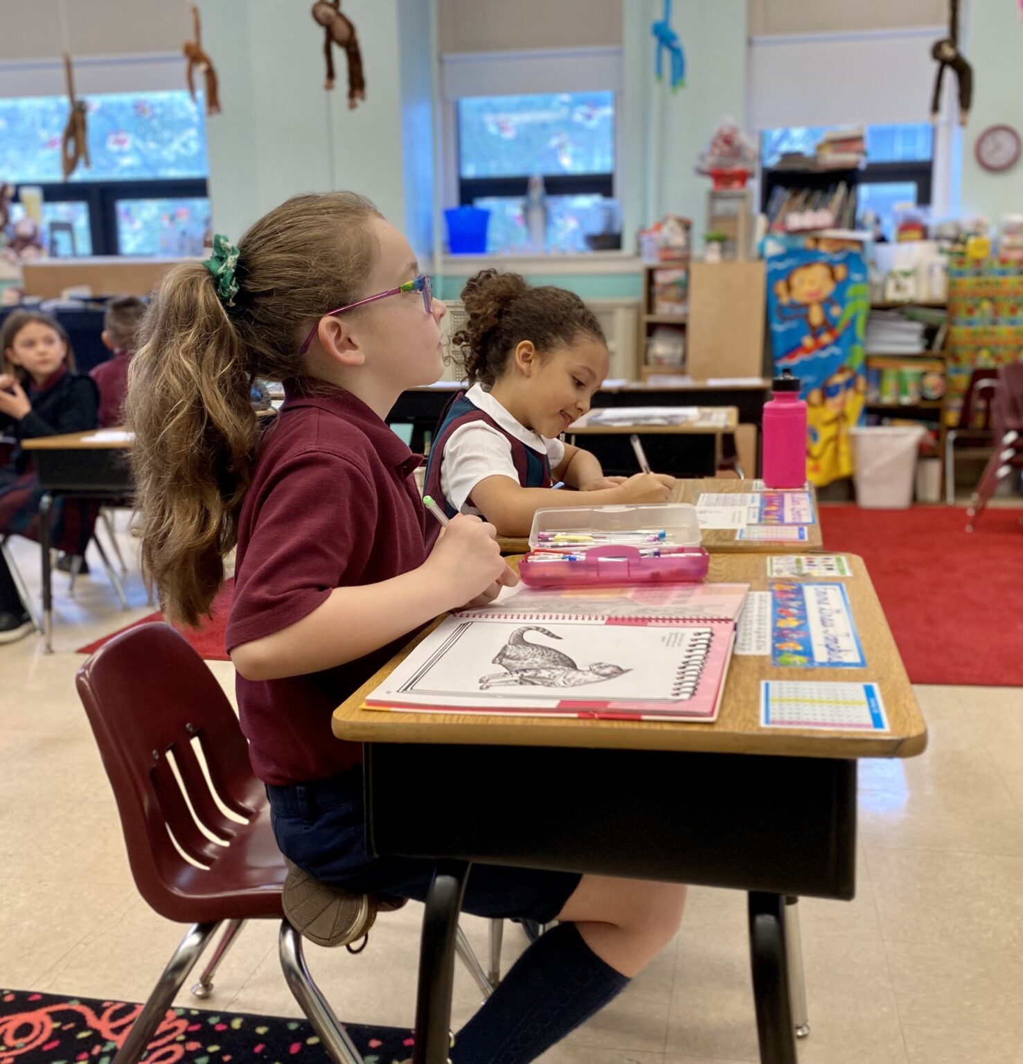 A student working at her desk